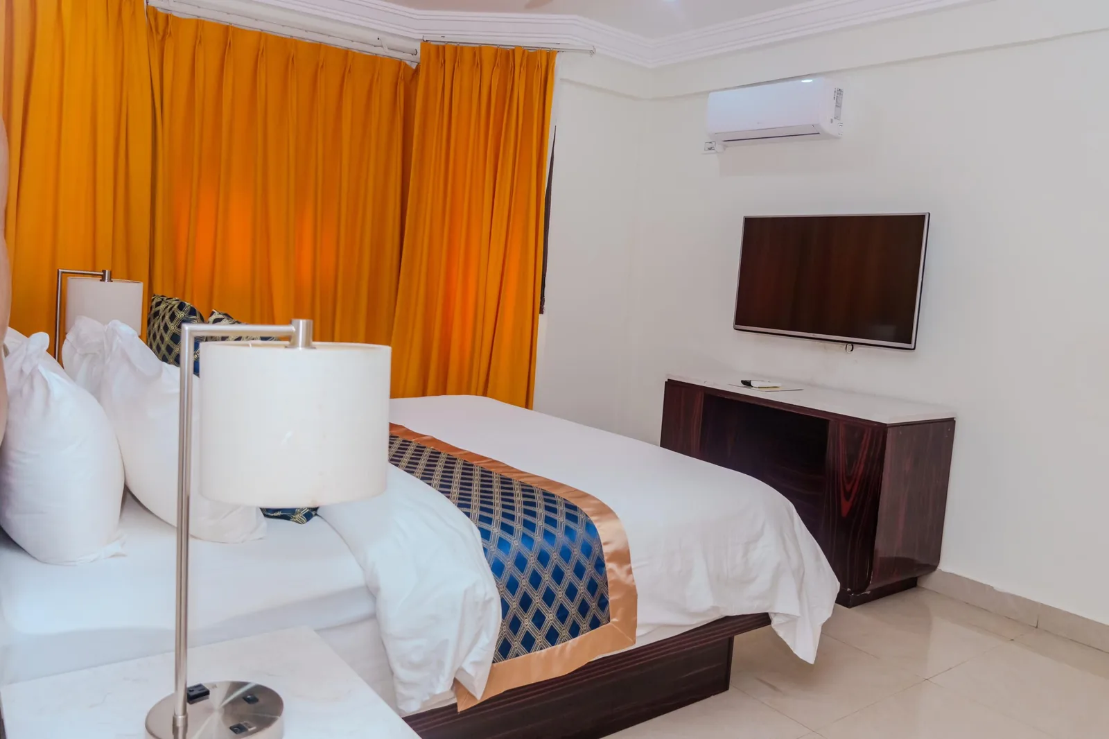 Bedroom interior at AM SeaView Residence & Hotel